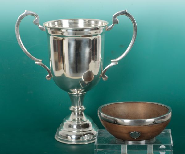 A SILVER PLATED TROPHY