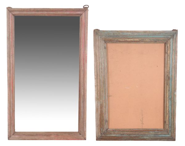 A RED-PAINTED AND DISTRESSED MIRROR