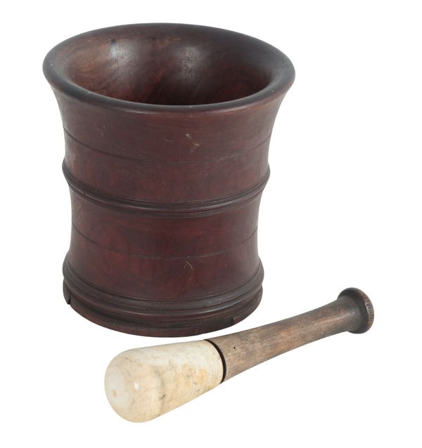 A TURNED WALNUT MORTAR