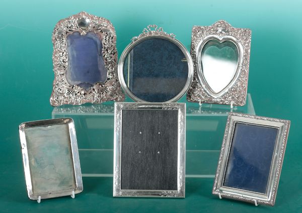 A GROUP OF SIX SILVER PICTURE FRAMES