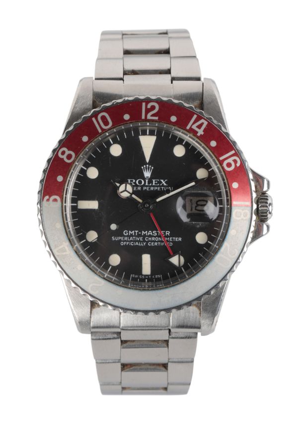 ROLEX GMT-MASTER OYSTER PERPETUAL: A GENTLEMAN'S STAINLESS STEEL BRACELET WATCH