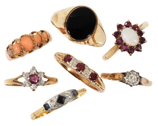 A COLLECTION OF SEVEN DRESS RINGS