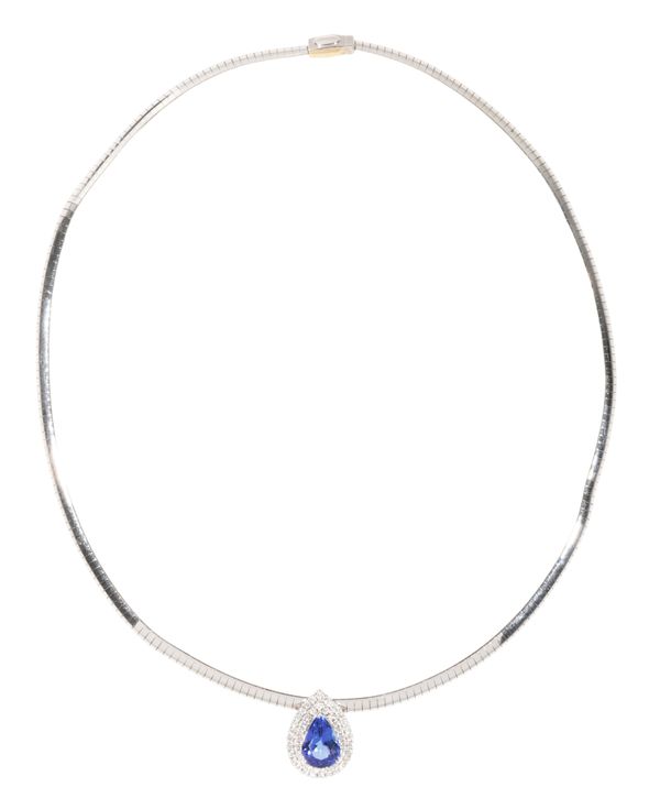 A TANZANITE AND DIAMOND PENDANT NECKLACE