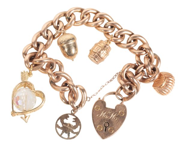 A 9CT GOLD CHARM BRACELET