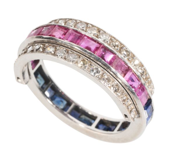 A DIAMOND, RUBY AND SAPPHIRE SWIVEL ETERNITY RING