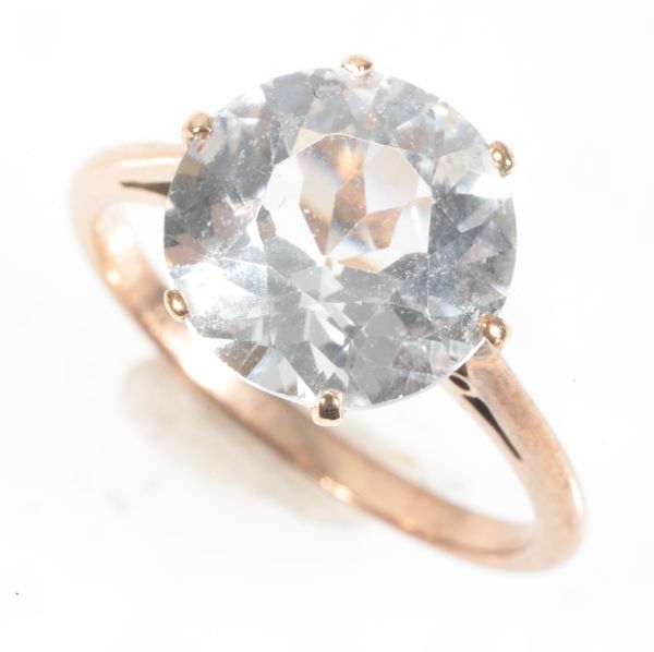 A WHITE TOPAZ SOLITAIRE RING