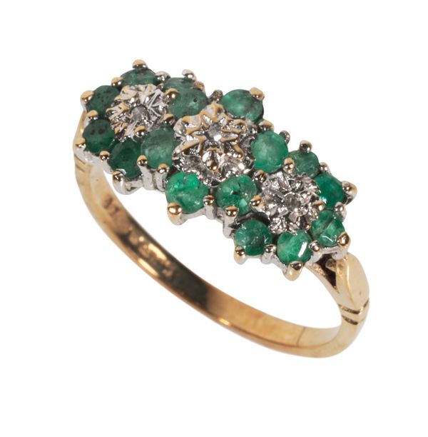 AN EMERALD AND DIAMOND TRIPLE CLUSTER DRESS RING
