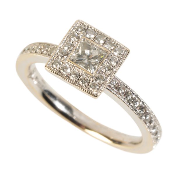 AN ART DECO STYLE DIAMOND RING