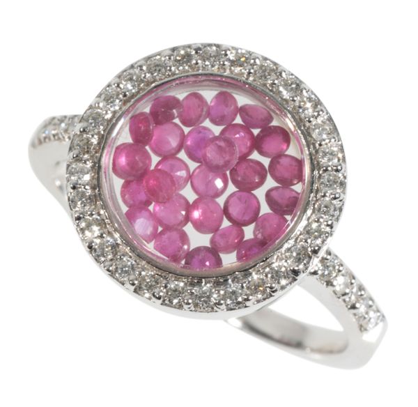 A DIAMOND AND RUBY BEAD RING