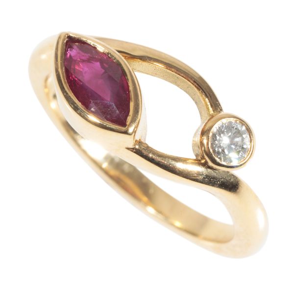 A RUBY AND DIAMOND CROSSOVER RING