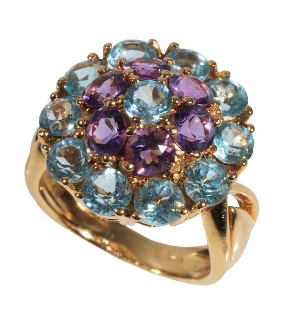 AN AMETHYST AND TOPAZ CLUSTER RING