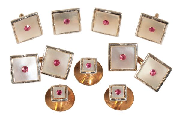 A SET OF GENTLEMAN'S CUFF LINKS AND MATCHING DRESS STUDS