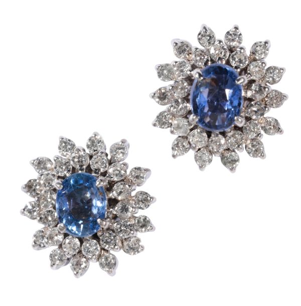 A PAIR OF TANZANITE AND DIAMOND CLUSTER EAR STUDS