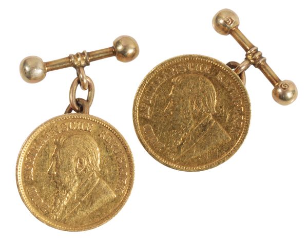 A PAIR OF ZULU AFRIKAANSCHE HALF POND COIN CUFF LINKS