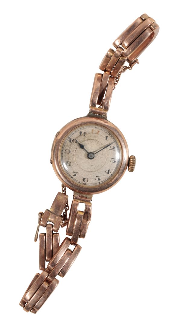 A LADY'S 9CT GOLD BRACELET WATCH