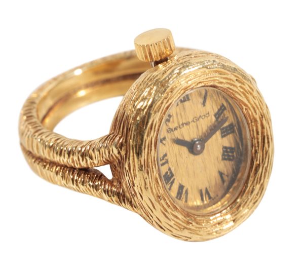 BUECHE-GIROD: AN 18CT GOLD WATCH RING