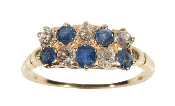 A SAPPHIRE AND DIAMOND CLUSTER RING