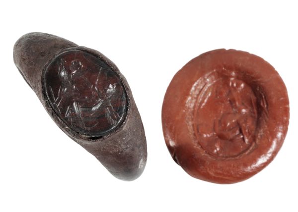 AN INTAGLIO SEAL RING