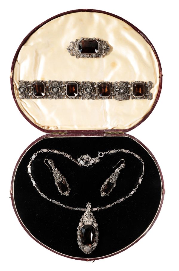 A 19TH CENTURY DEMI-PARURE OF MARCASITE AND SMOKY QUARTZ JEWELLERY