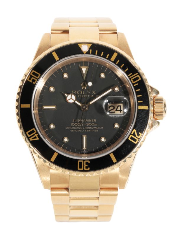 ROLEX OYSTER PERPETUAL DATE SUBMARINER: AN 18CT GOLD GENTLEMAN'S BRACELET WATCH