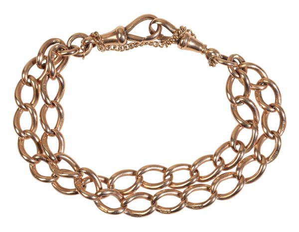 A DOUBLE CHAIN LINK UNMARKED GOLD BRACELET