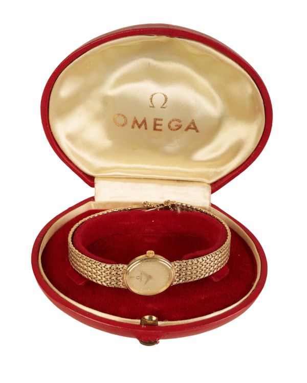 OMEGA: A LADY'S 9CT GOLD BRACELET WATCH