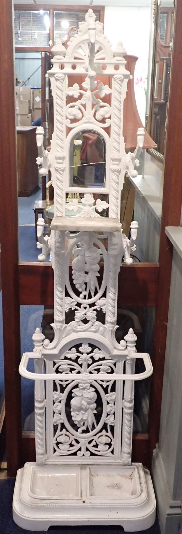 A CAST-IRON HALL STAND