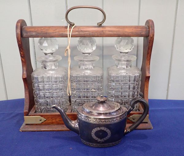 A THREE DECANTER VICTORIAN TANTALUS