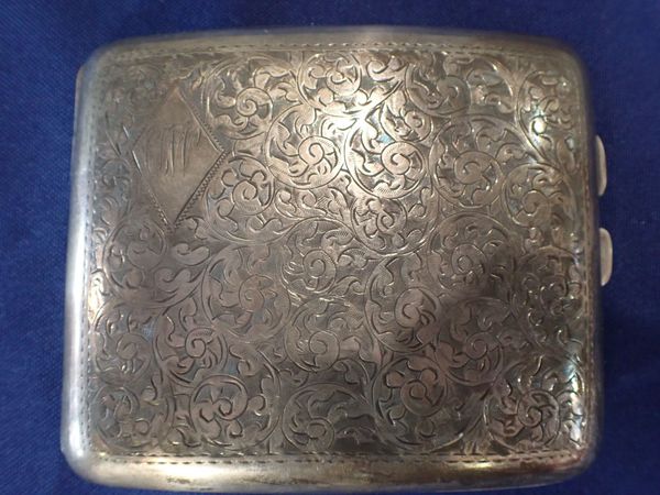 A GEORGE V SILVER CIGARETTE CASE