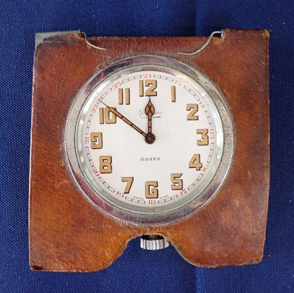 A MAPPIN TRAVEL CLOCK, BROWN LEATHER SURROUND (FROM A VANITY CASE)