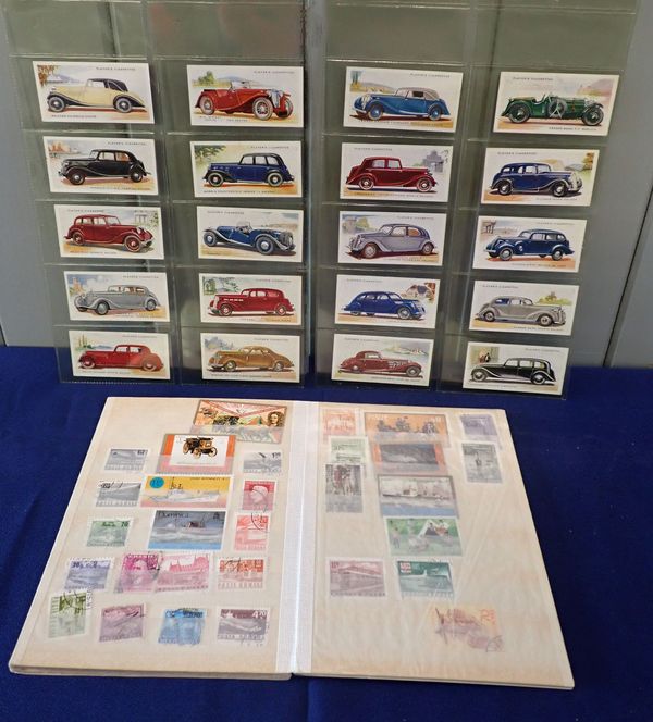 A COLLECTION OF STAMPS AND CIGARETTE CARDS