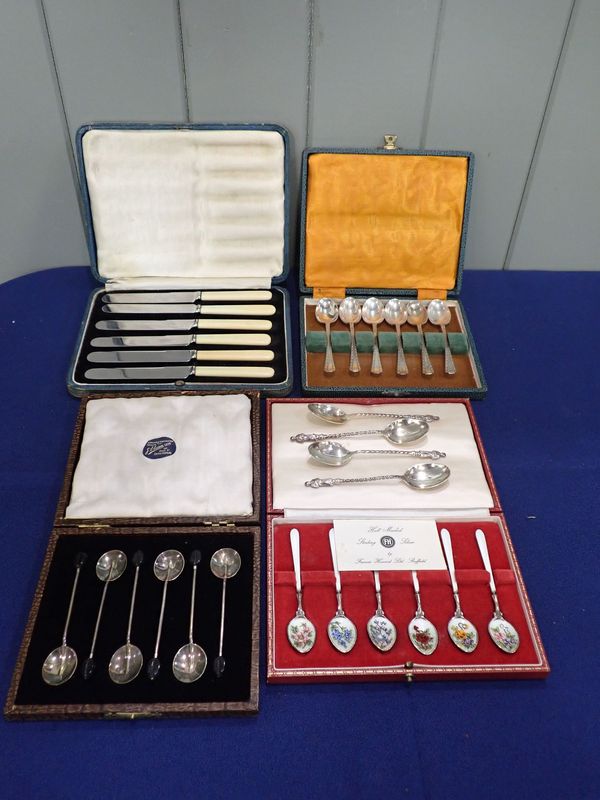 FOUR BOXED SETS OF SILVER SPOONS