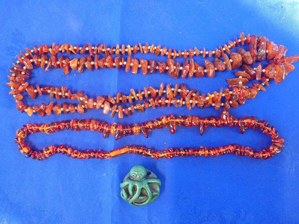 TWO AMBER TYPE BEADED NECKLACES