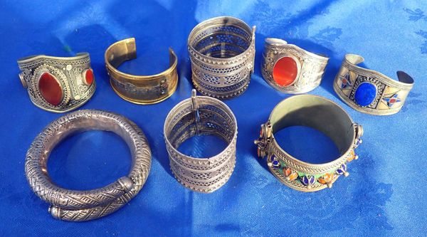 A COLLECTION OF INDIAN STYLE WHITE METAL BANGLES