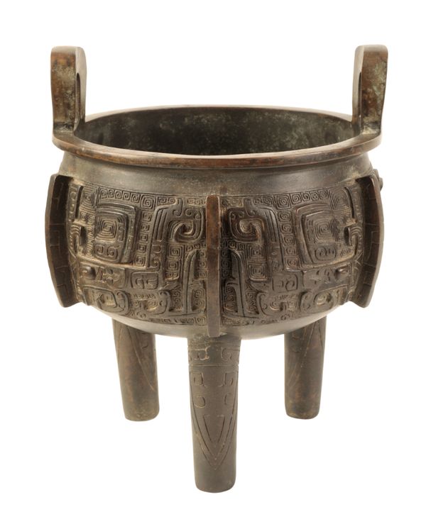 A CHINESE BRONZE TRIPOD DING