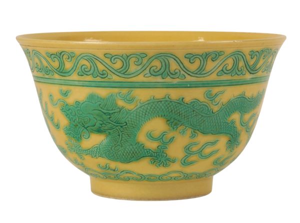 A CHINESE YELLOW-GROUND GREEN ENAMLLED 'DRAGON' BOWL
