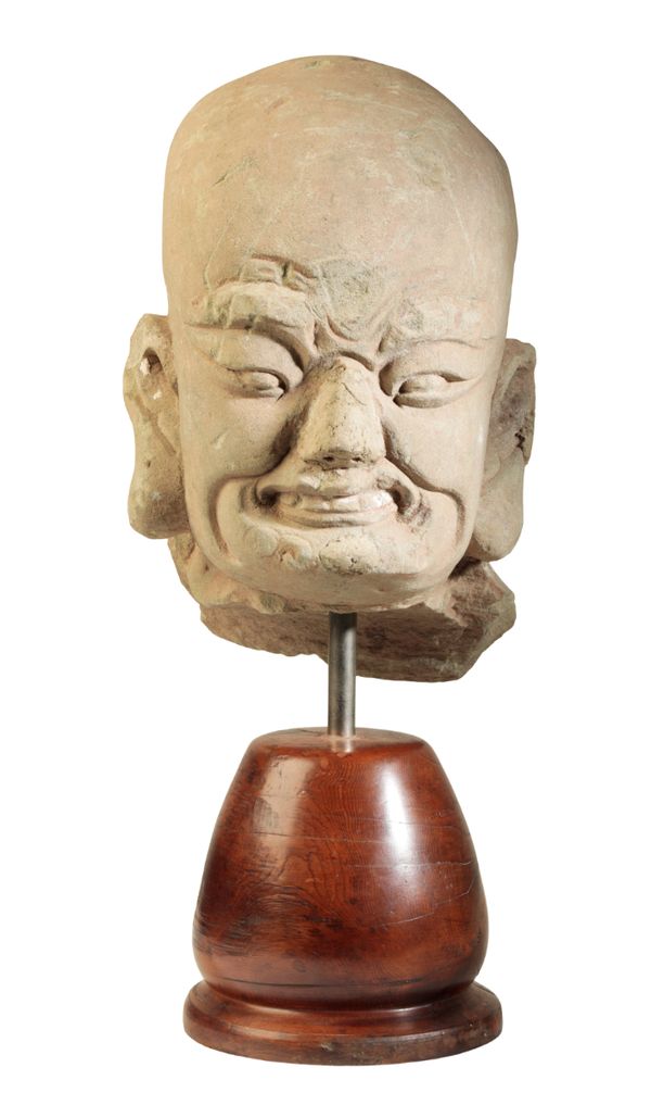 A CHINESE SANDSTONE HEAD OF A LOHAN