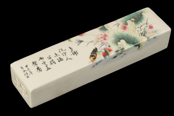 A CHINESE CERAMIC PAPERWEIGHT