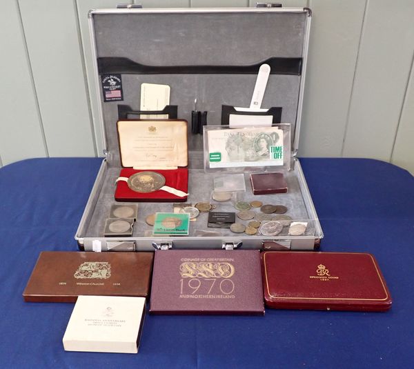 A COLLECTION OF SPECIMEN COIN SETS