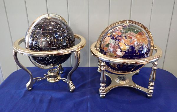 A NEAR PAIR OF MODERN TABLE GLOBES