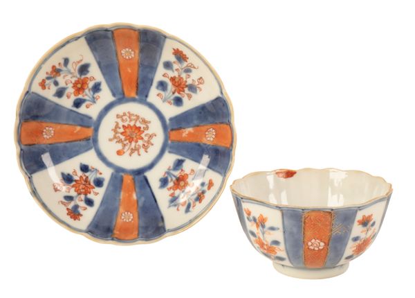 A 19TH CENTURY IMARI DECORATED PORCELAIN TEABOWL AND SAUCER