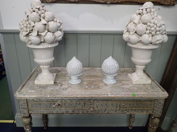 A PAIR OF ITALIAN URNS WITH FRUIT