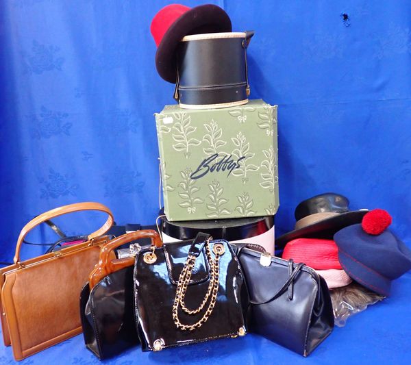 A COLLECTION  OF LADY'S HATS, HANDBAGS AND WIGS