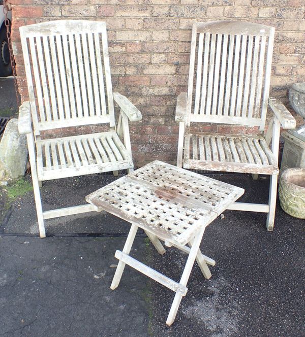 A PAIR OF LINDSEY TEAK GARDEN ARMCHAIRS AND MATCHING TABLE
