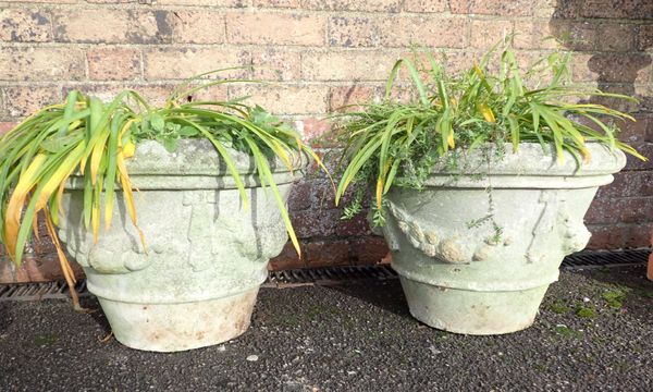 A PAIR OF RECONSTITUTED GARDEN PLANTERS