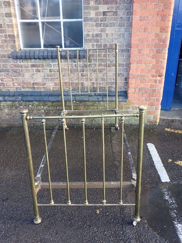A VICTORIAN SINGLE BRASS BED