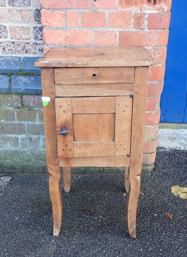 A FRENCH PROVINCIAL FRUITWOOD BEDSIDE CUPBOARD