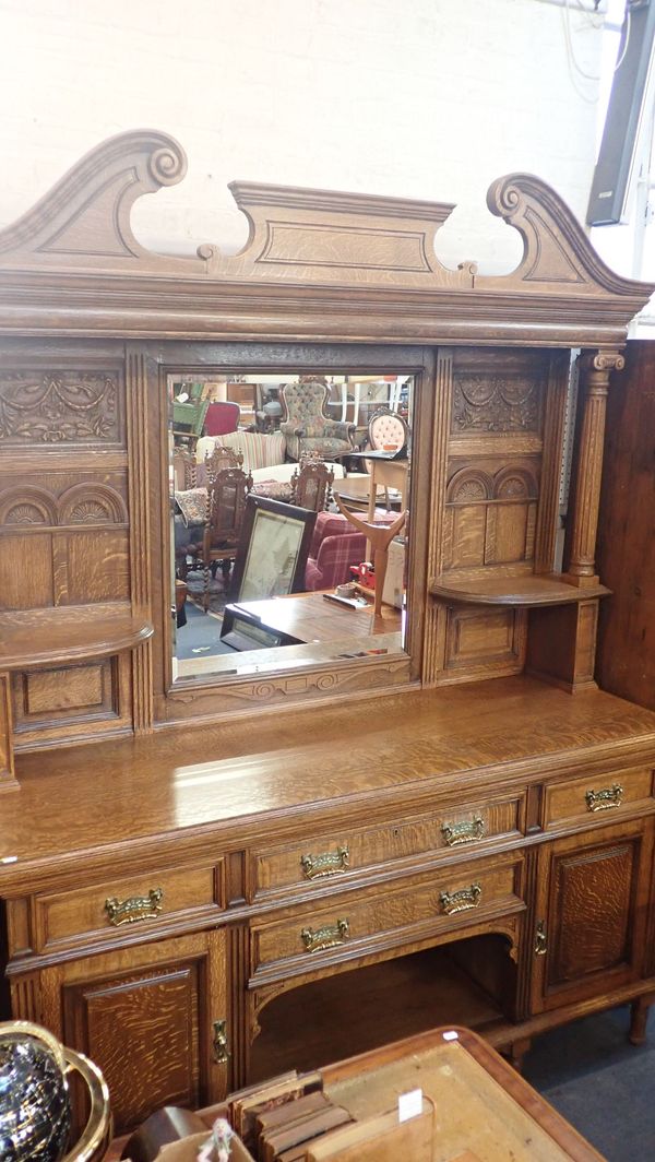 A LATE VICTORIAN OAK BUFFET