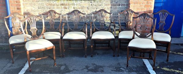 A SET OF EIGHT MAHOGANY HEPPLEWHITE STYLE DINING CHAIRS