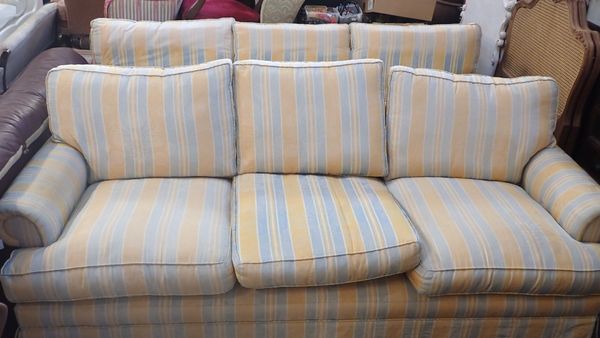 A PAIR OF COUNTRY HOUSE STYLE SOFAS
